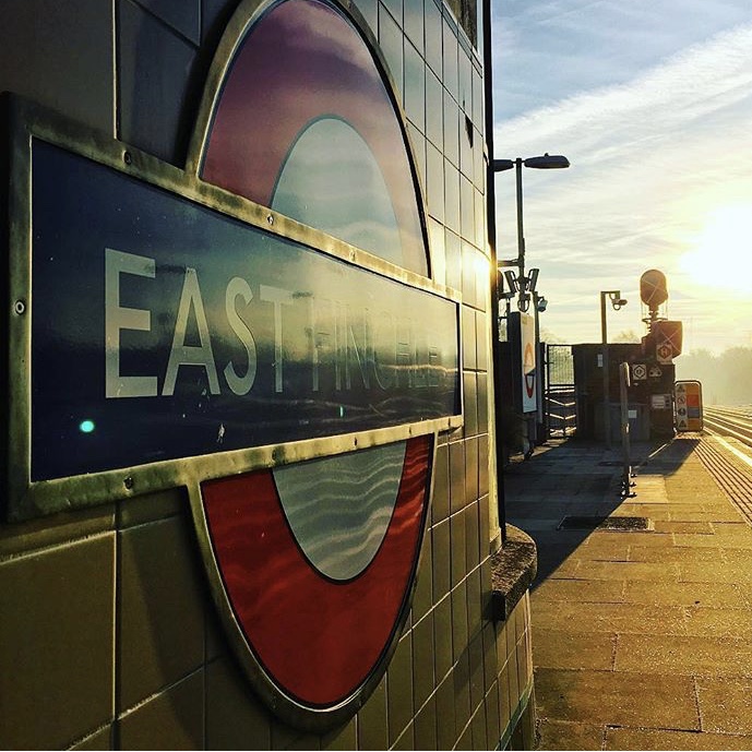 Photo of East Finchley Tube Station Roundel on the Northbound Platofrom at sunrise